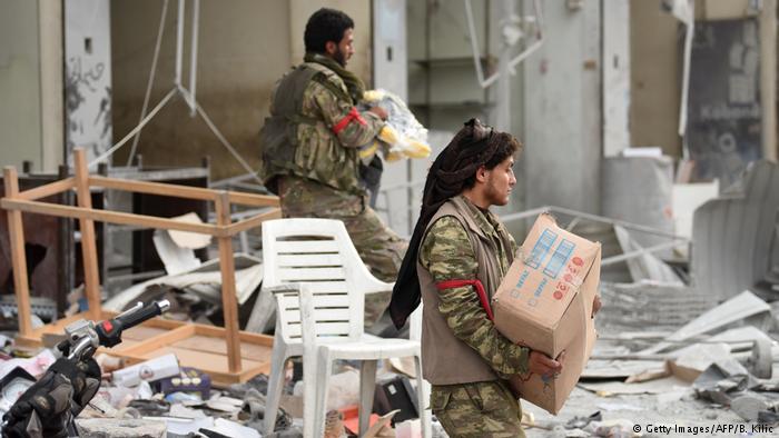 Li Efrînê milkên sivîlan talan dikin