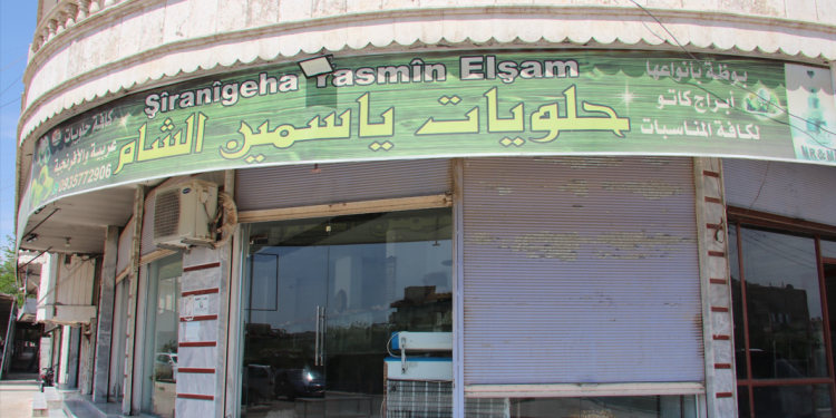 ‘Bi saya şoreşê min firoşgeheke şêraniyê vekir’