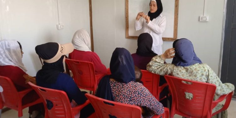 ‘Weqfa jin li kampa Waşokanî ji bo piştgiriya jinê dixebite’