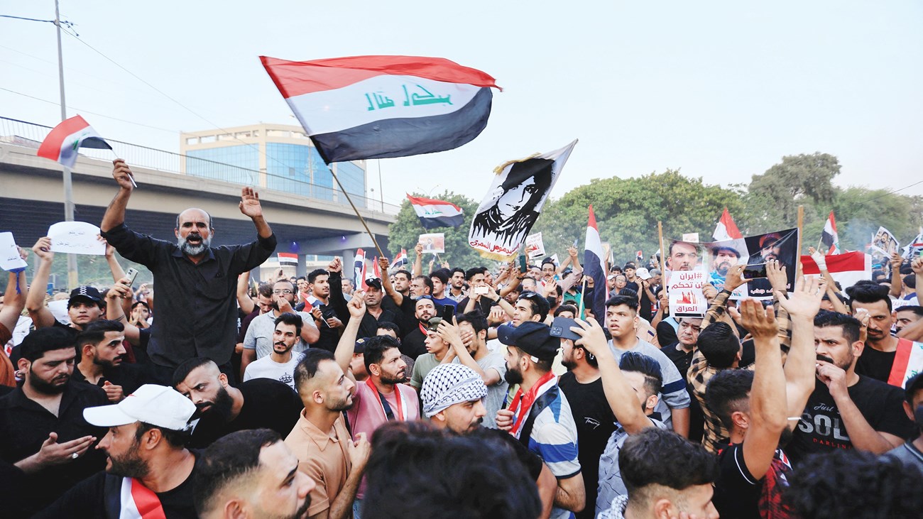 العراق النموذج بين النظام المهيمن والديمقراطية المجتمعية في المشهد الإقليمي