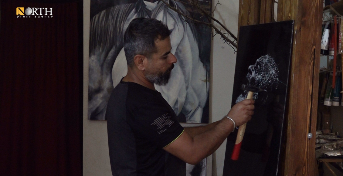 الرسم على الزجاج.. فنان من كوباني يخوض تجربة جديدة في المنطقة
