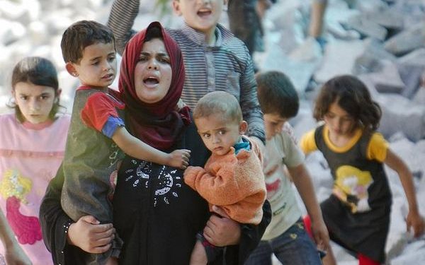 الأم السورية نبع الحنان وشمس الحرية