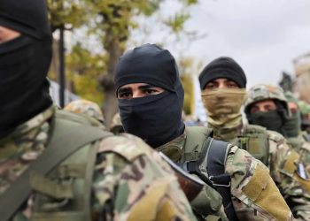 التجنيس غير الرسمي للمسلحين الأجانب في سوريا وآلية التنفيذ