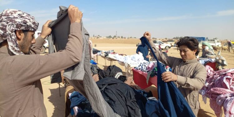 تجارة الألبسة المستعملة.. ملاذ أهالي تل حميس من الغلاء ومهنة تعكس روح التكافل بين الشعوب